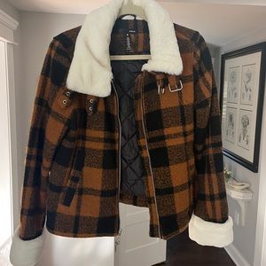 Plaid Motorcycle Fur lined jacket with hardware buckles and fur cuffs
